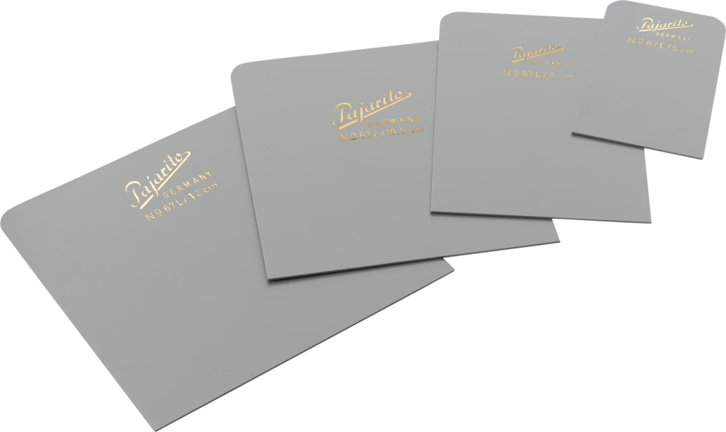A set of four light gray plastic templates or rulers with rounded corners. Each template features gold text detailing the brand 'Pajarito,' the country of manufacture 'Germany,' and a size indication in centimeters. The templates vary in size, with measurements of 5 cm, 8 cm, 10.5 cm, and 12 cm.