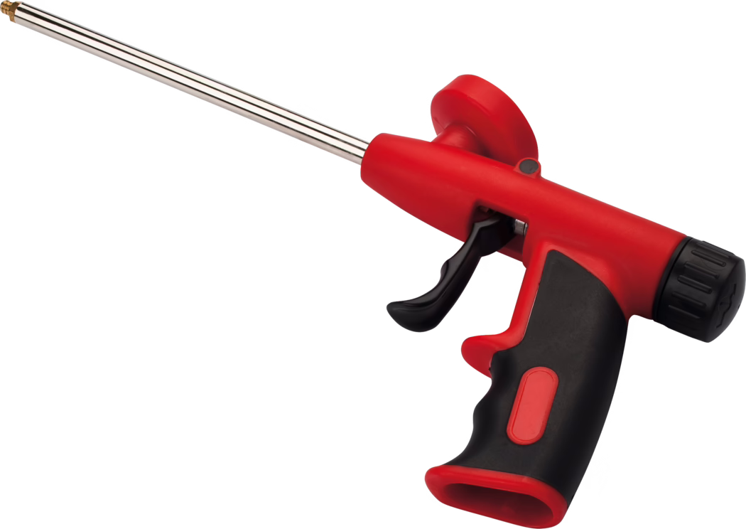 Pajarito_Dummy_Filling foam gun Easy Line_021286_2021-02 A red and black air blower tool, featuring a long metallic nozzle and a comfortable grip, designed for blowing dust and debris from various surfaces.