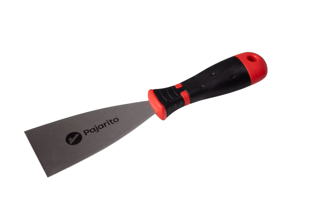 Pajarito_Dummy_Painter spatula soft handle_012862_ 012863_ 012864_ 012865_ 012866_ 012867_2021-02 A stainless steel spatula with a black and red ergonomic handle featuring a textured grip. The spatula has a wide, flat blade ideal for flipping or serving food, with the brand name 'Pajarito' printed on the blade.
