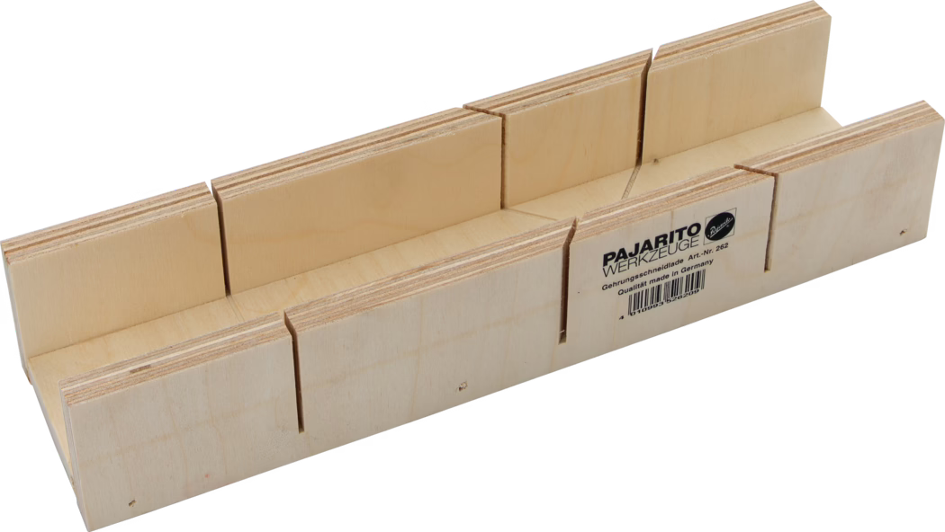 A wooden miter box, also known as a mitering tool, designed for making precise angled cuts. The box features multiple slots to guide a saw at specific angles, allowing for accurate trimming of moldings or other materials. It is made of light-colored plywood and has clear markings indicating the angles available. An attractive and functional tool for woodworking enthusiasts.