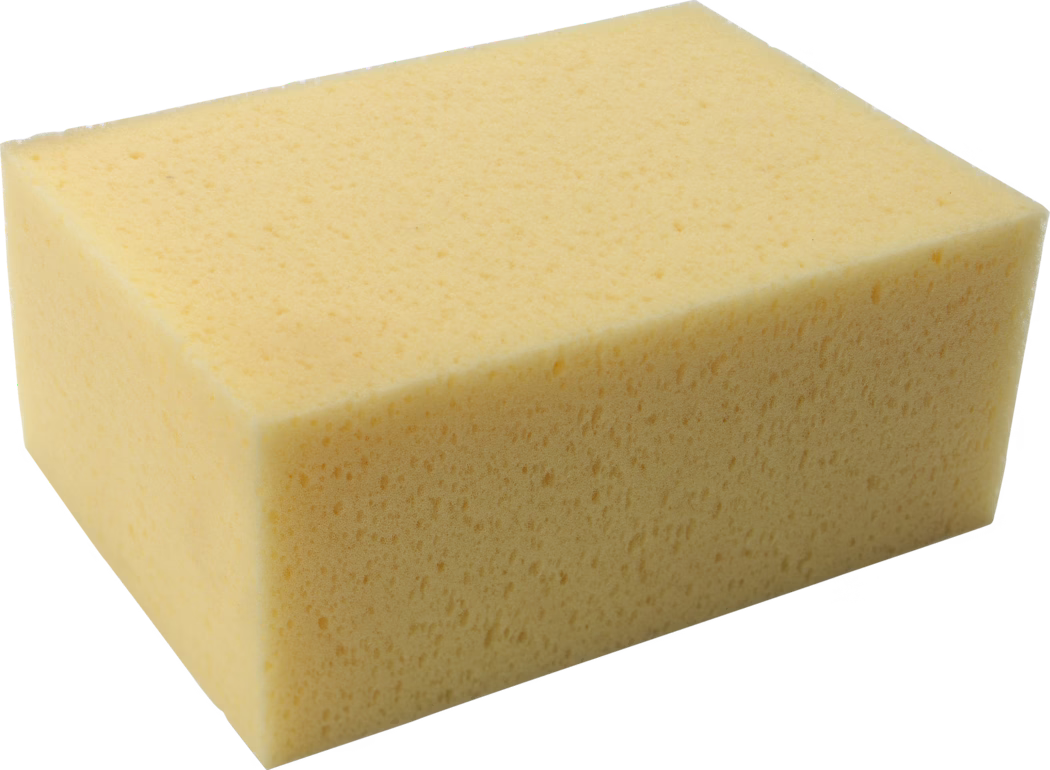 Pajarito_Dummy_Tile sponge_089391_2021-02 A rectangular yellow foam cleaning sponge with fine, uniform pores and straight edges, photographed on a white background.