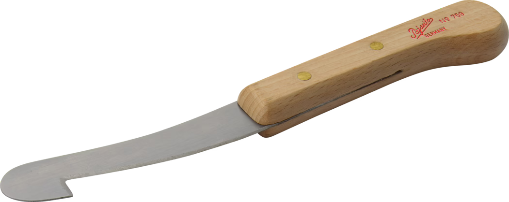 Pajarito_Dummy_Cardboard ripper_038630_2021-02 A cheese knife featuring a curved stainless steel blade and a wooden handle, designed for slicing and serving cheese. The blade has a unique shape that allows for easy cutting through various types of cheese, while the ergonomic wooden handle provides a comfortable grip. The knife is stamped with the brand name and the country of manufacture, indicating quality craftsmanship.