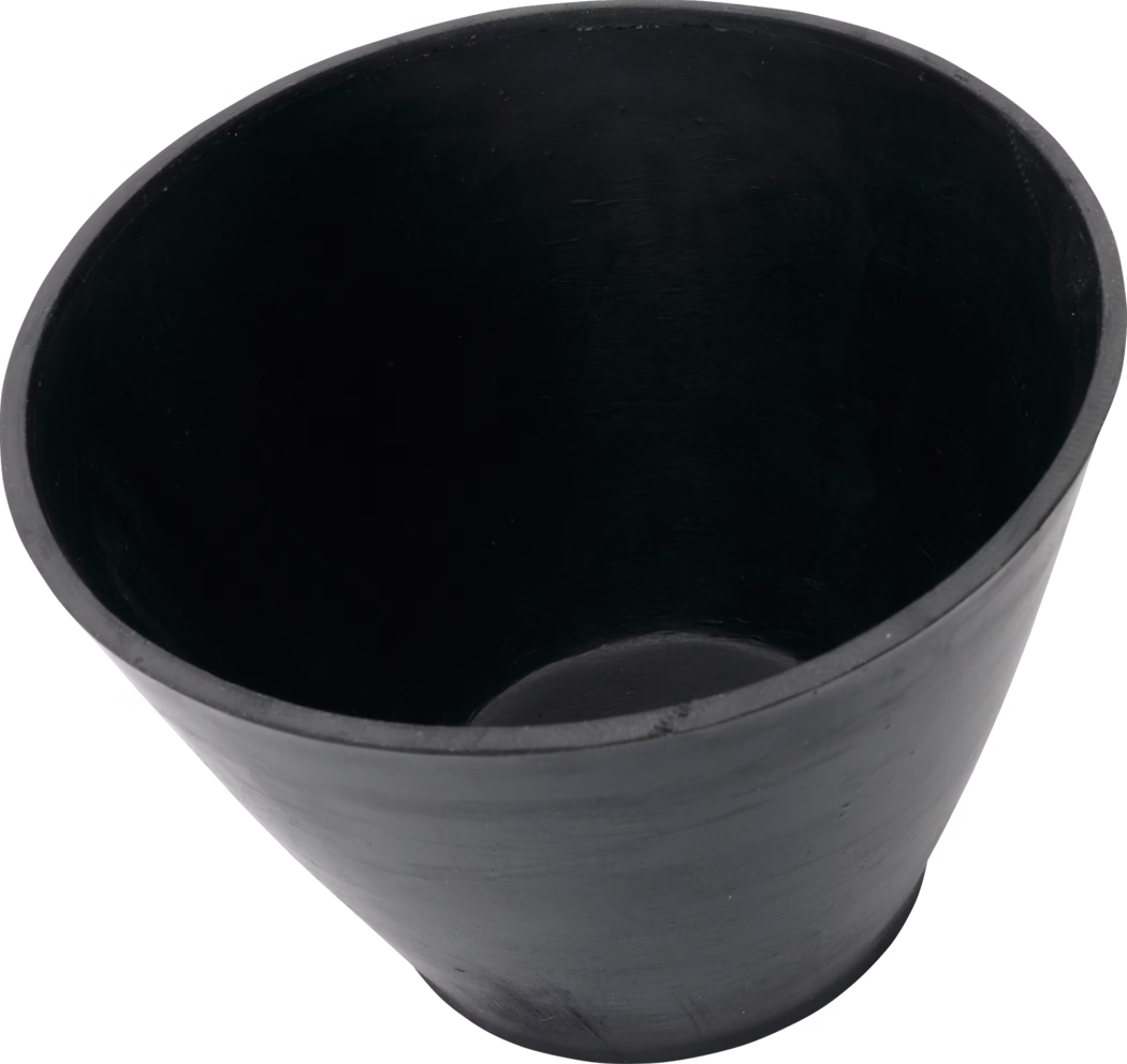 Pajarito_Dummy_Plaster cup conical shape rubber_089425_2021-02 A black rubber bowl with a conical shape. The interior is smooth and dark, reflecting minimal light. The rim is slightly wider than the base, giving it a stable structure. This bowl is suitable for various uses, possibly in gardening, mixing, or as a container for small items.