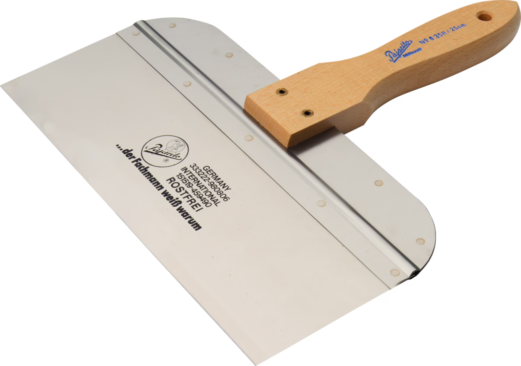 A metal spatula used for spreading or smoothing materials, featuring a wooden handle. The blade is wide and flat, made of stainless steel, reflecting a polished surface. The handle is ergonomically designed for a comfortable grip, and the overall tool is often utilized in construction or crafting.